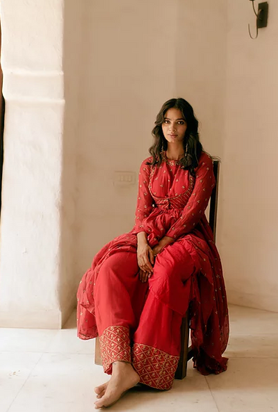 Astha Narang Red Anarkali with Coti work - The Grand Trunk